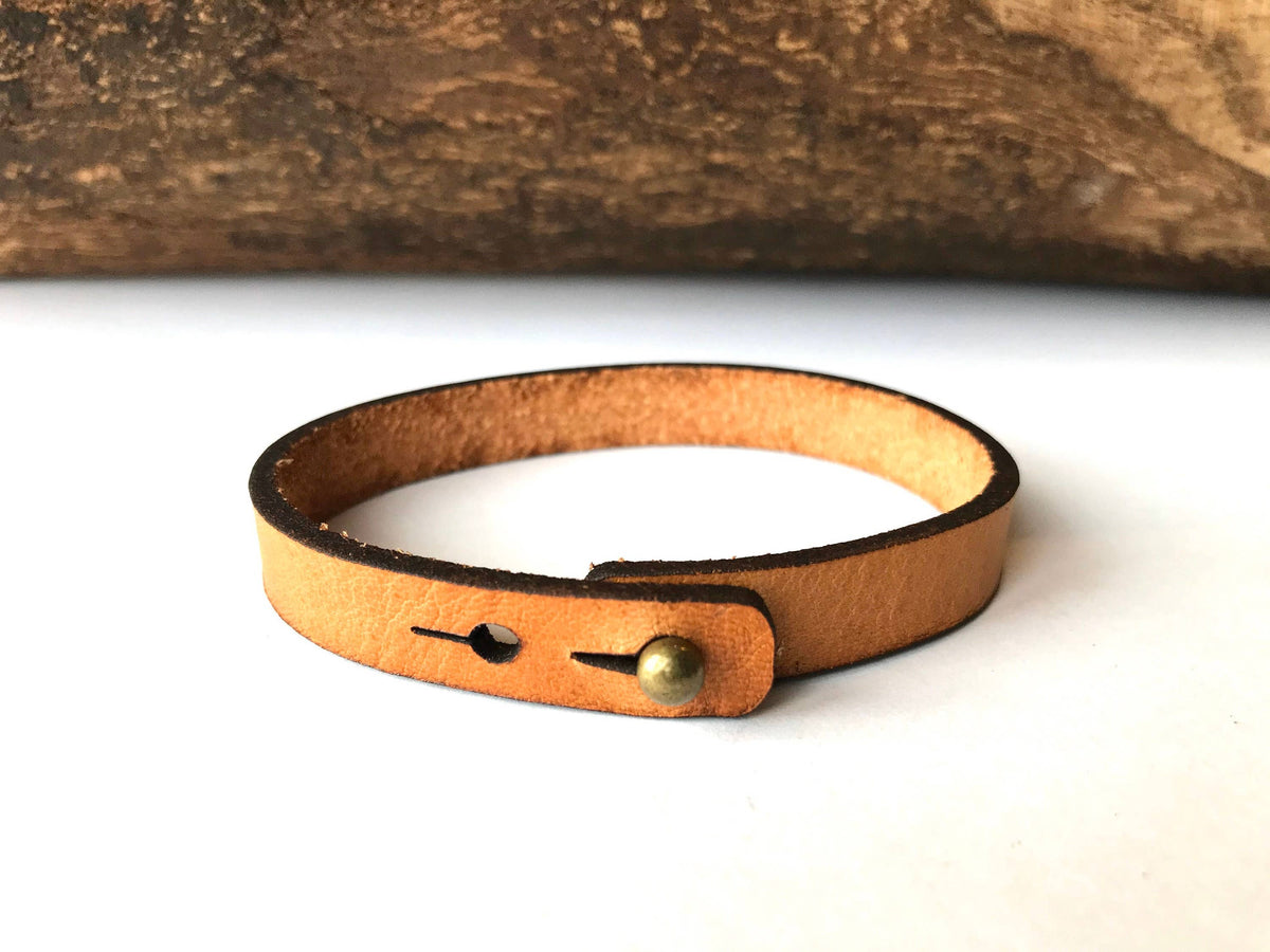 The Solace Engraved Leather Bracelet – Skinny Adjustable Cross Cuff in Full Grain Leather