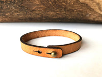 The Solace Engraved Leather Bracelet – Skinny Adjustable Cross Cuff in Full Grain Leather