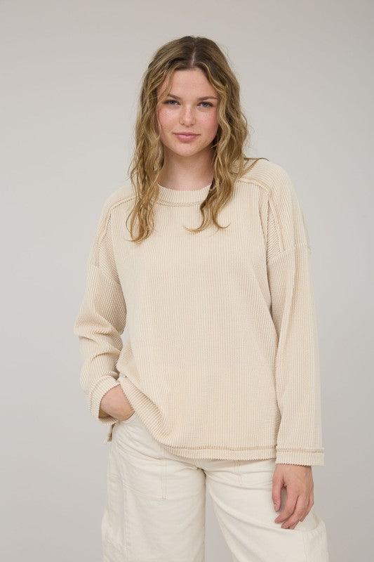 The Fallon Ribbed Exposed Seam Pullover:Cream – Raw Edge Cream Knit Top