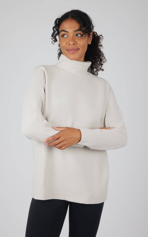 The Elara Cozy Quilted Funnel Neck Tunic – Brushed Knit Pullover