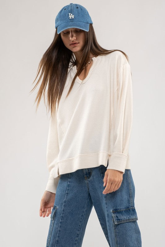 Evie Raw Edge Split Neck Long Sleeve Top: Cream