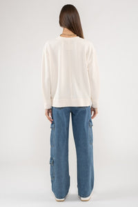 Evie Raw Edge Split Neck Long Sleeve Top: Cream