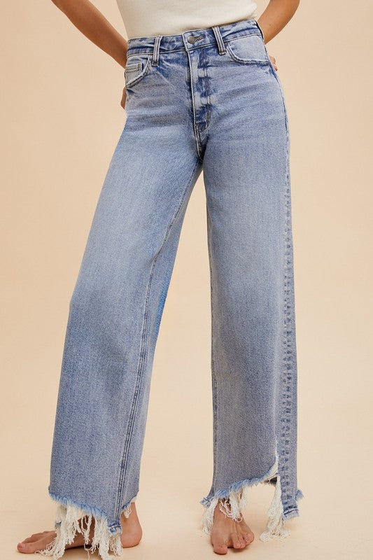 The Rebel Edge High-Rise Jeans – Stretch Denim with Asymmetrical Distressed Hem