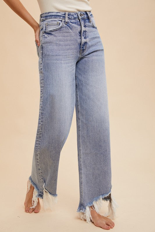 The Rebel Edge High-Rise Jeans – Stretch Denim with Asymmetrical Distressed Hem