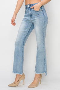 Risen High Rise Step Hem Crop Flare Jeans: Light Wash