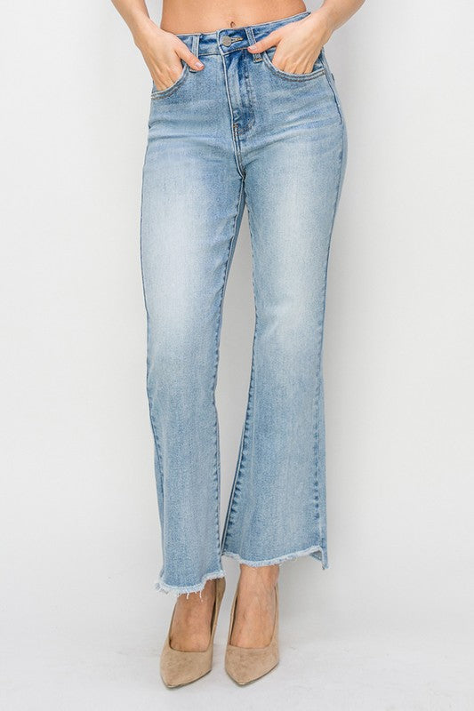 Risen High Rise Step Hem Crop Flare Jeans: Light Wash