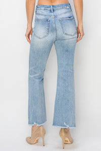 Risen High Rise Step Hem Crop Flare Jeans: Light Wash