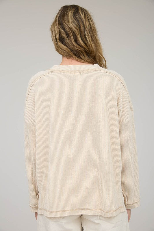 The Fallon Ribbed Exposed Seam Pullover:Cream – Raw Edge Cream Knit Top