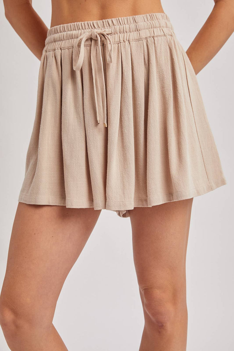 The Alaina Flowy Drawstring Shorts: Oatmeal – Soft Pleated Skort-Style Fit