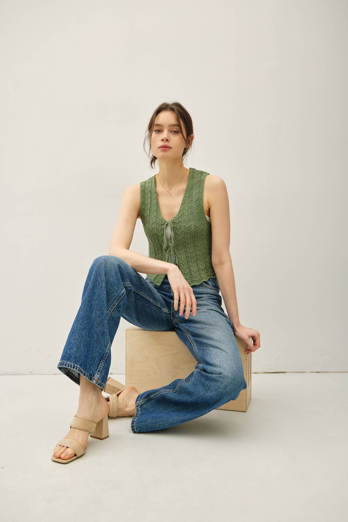The Bellamy Knit Tie Vest: Soft Pine – Soft Sweater Vest with Wavy Hem Detail for Women