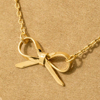 Gold Dipped Ribbon Bow Pendant Necklace: S
