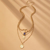Gold Multi Layer Celestial Cross Necklace – Blue Geometric Stone Charm Necklace