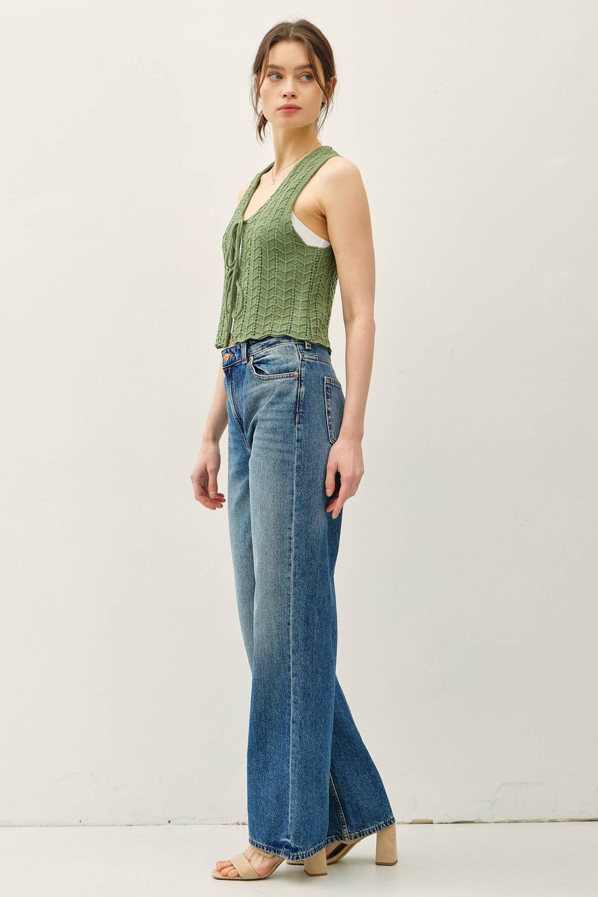 The Bellamy Knit Tie Vest: Soft Pine – Soft Sweater Vest with Wavy Hem Detail for Women